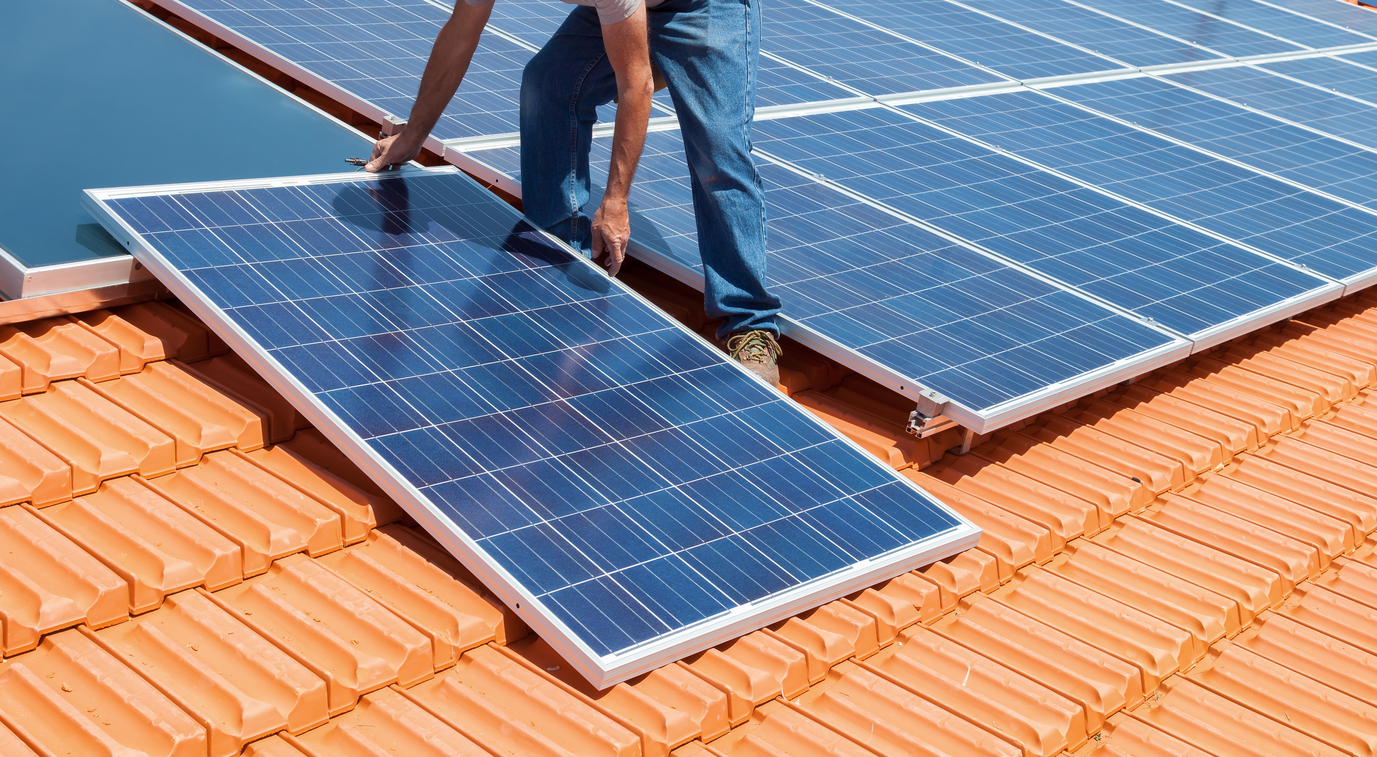 Installation of solar panels on a tile roof
